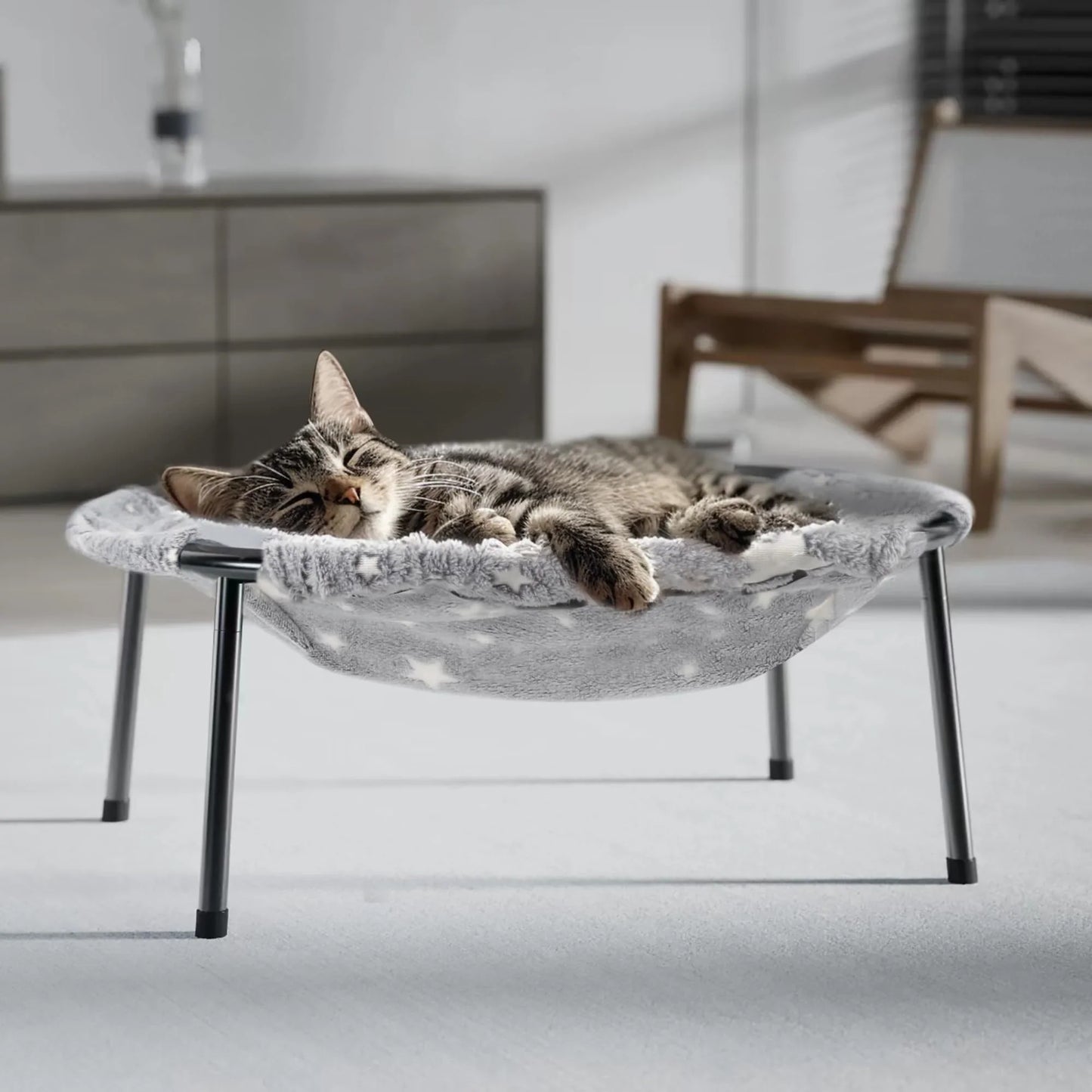 Large pet hammock—a soothing elevated pet bed designed specifically for cats and small dogs. This soft, anxiety-relieving, glow-in-the-dark indoor pet bed provides comfortable support.